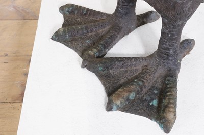 Lot 66 - A pair of patinated bronze geese