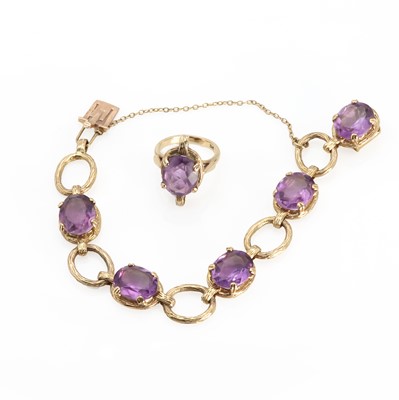 Lot 1173 - A gold amethyst bracelet and ring suite
