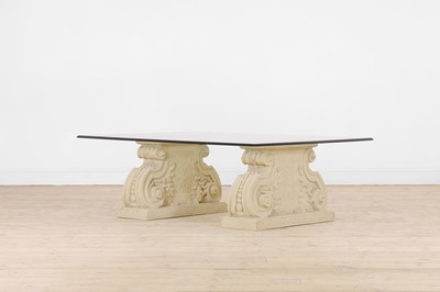 Lot 228 - A bevelled glass and Haddonstone coffee table