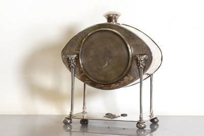 Lot 85 - An Arts and Crafts silver-plated desk clock