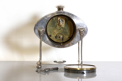 Lot 85 - An Arts and Crafts silver-plated desk clock