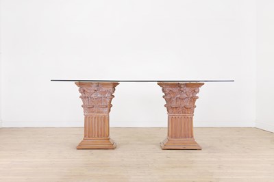 Lot 230 - A glass and wood dining table