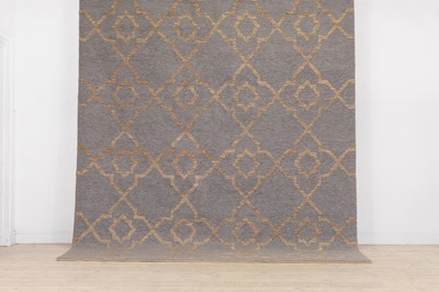 Lot 454 - A wool carpet