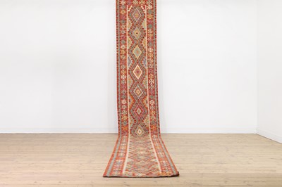 Lot 595 - A long kilim wool runner