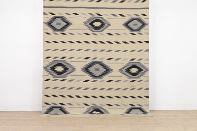 Lot 446 - A Navajo-inspired flat-weave wool carpet