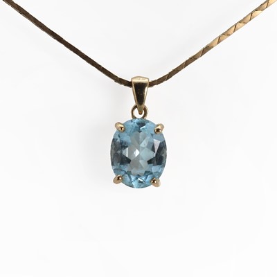 Lot 1148 - A 9ct gold topaz pendant