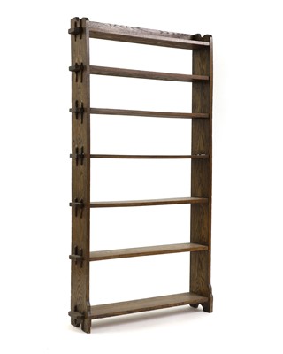 Lot 231 - An Arts and Crafts oak open bookcase
