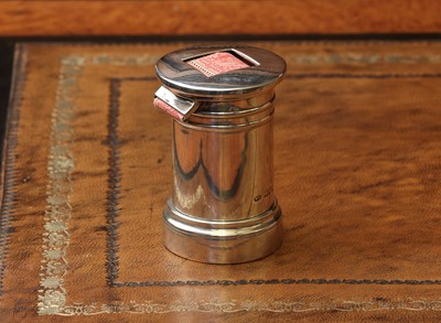 Lot 77 - A novelty silver stamp dispenser