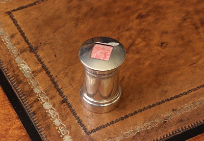 Lot 77 - A novelty silver stamp dispenser