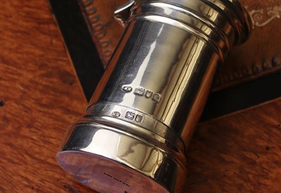 Lot 77 - A novelty silver stamp dispenser