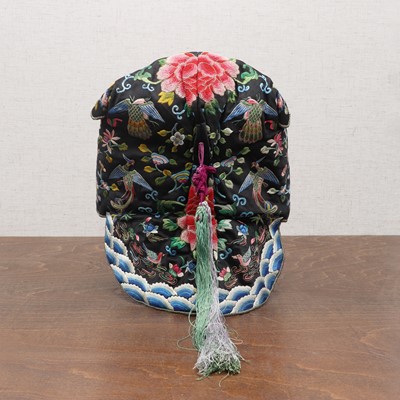 Lot 348 - A Chinese embroidered child's hat