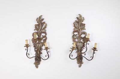 Lot 115 - A pair of carved and painted wood wall lights