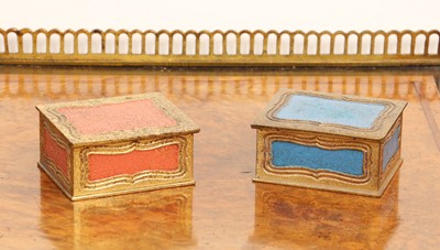 Lot 100 - A pair of Tiffany Studios 'His and Hers' stamp boxes