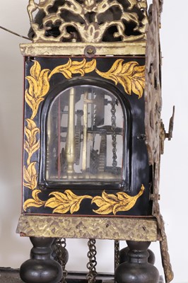 Lot 352 - A polychrome-painted 'stoelklok' wall clock