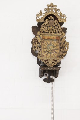 Lot 352 - A polychrome-painted 'stoelklok' wall clock