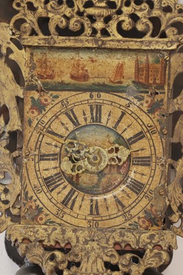 Lot 352 - A polychrome-painted 'stoelklok' wall clock