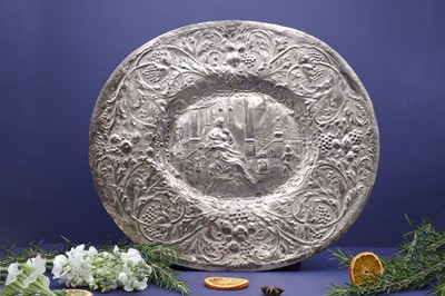 Lot 333 - A chased silvered metal oval dish