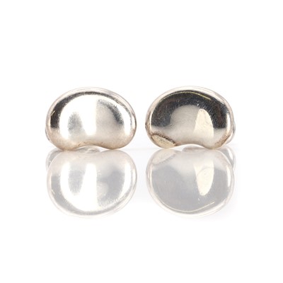 Lot 1393 - A pair of sterling silver Tiffany & Co. Elsa Peretti bean cufflinks