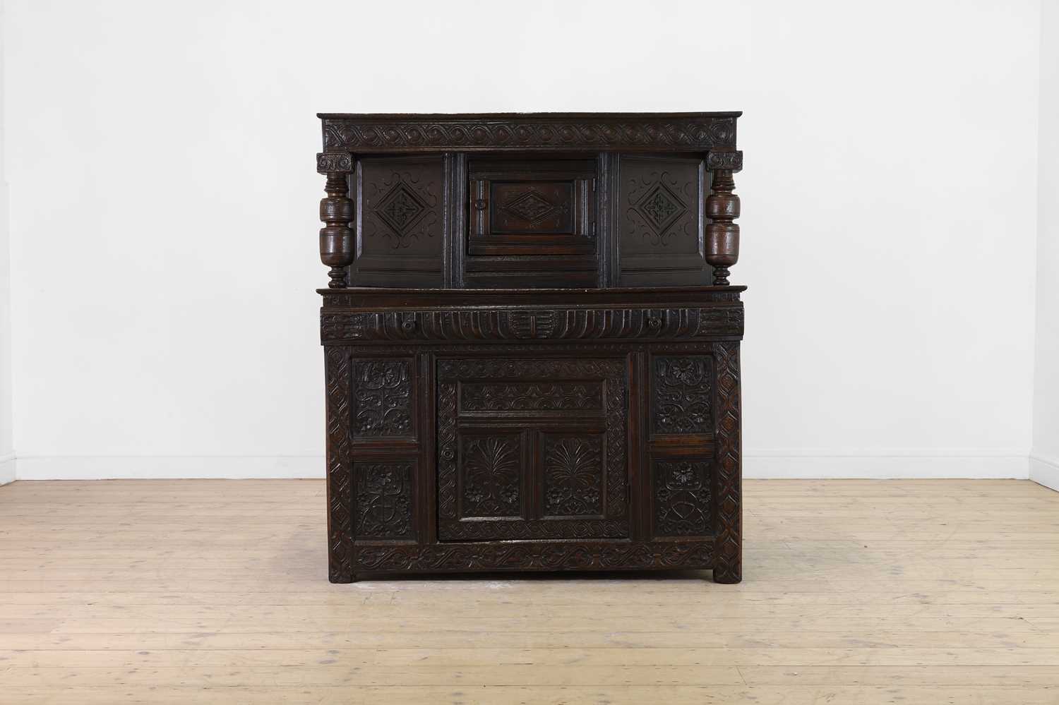 Lot 350 - A Charles I oak court cupboard