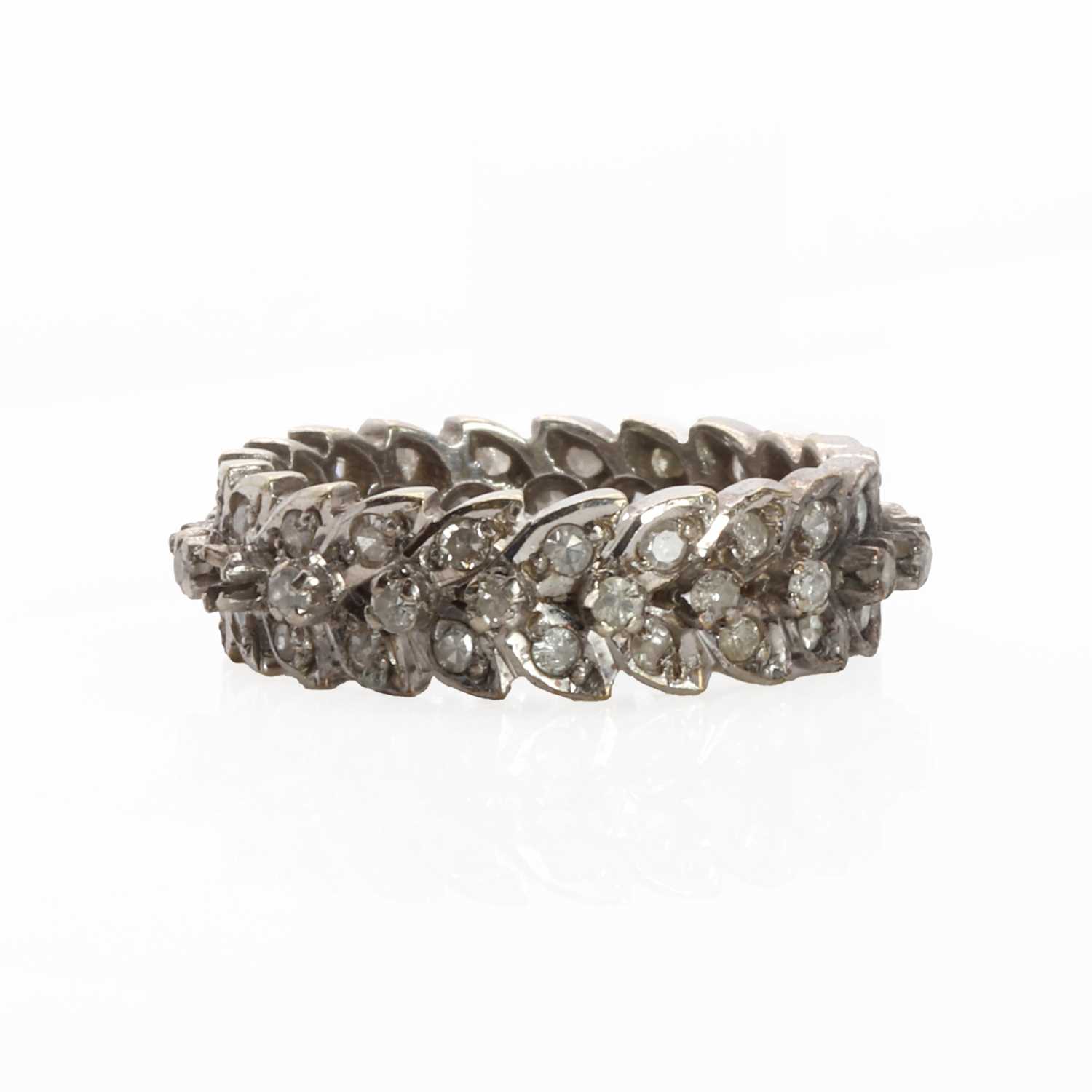 Lot 1081 - A white gold diamond eternity ring