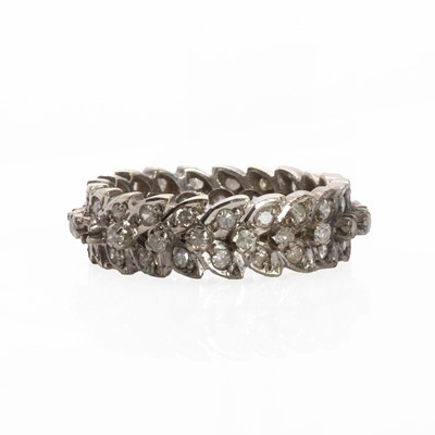Lot 1081 - A white gold diamond eternity ring