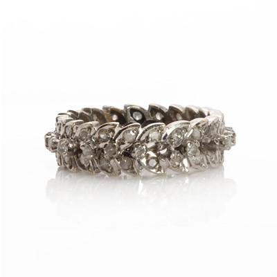 Lot 1081 - A white gold diamond eternity ring