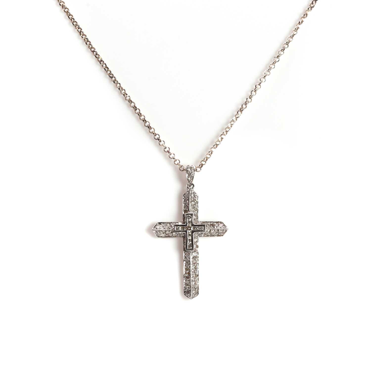 Lot 1092 - A white gold diamond cross pendant