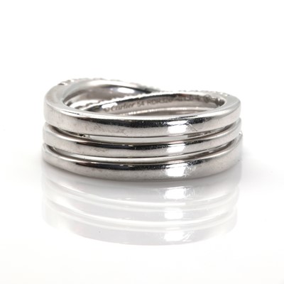 Lot 134 - An 18ct white gold 'Étincelle' three row diamond half eternity ring, by Cartier