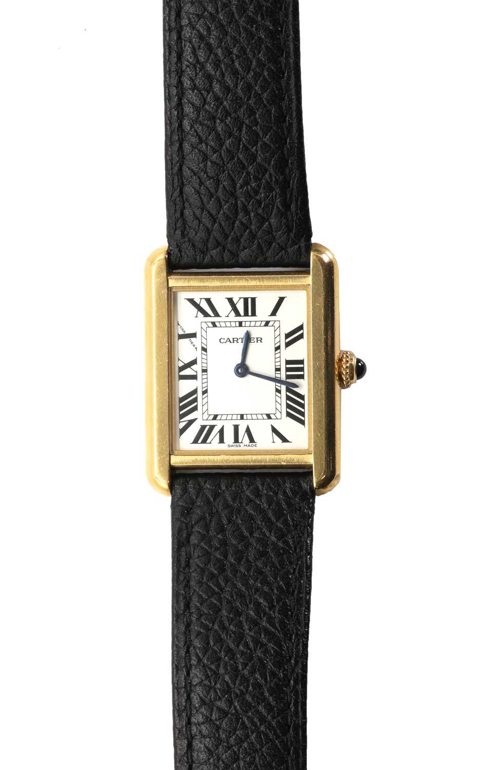 Lot 313 - A ladies' gold and stainless steel Cartier Tank Solo quartz strap watch