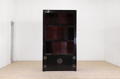 Lot 398 - A black and red lacquered display cabinet