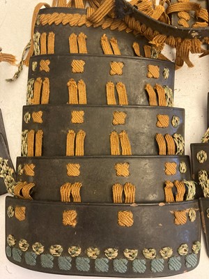 Lot 116 - A collection of Japanese armour parts