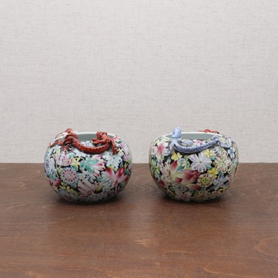 Lot 404 - A pair of Chinese famille rose jars
