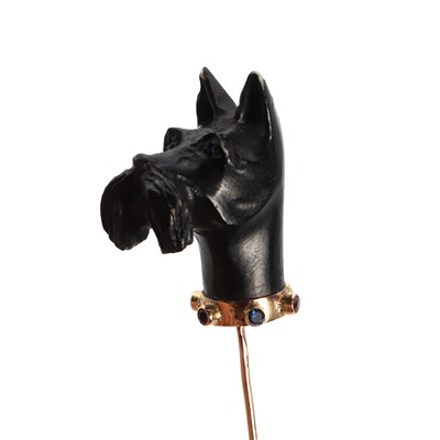 Lot 1131 - A dog's head stick pin set with coloured stones