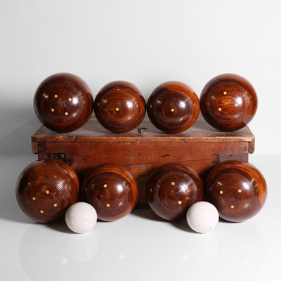 Lot 74 - A set of lignum vitae lawn bowls