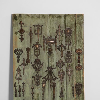 Lot 77 - A gilt-metal furniture mount display