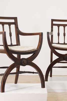 Lot 171 - A pair of mahogany armchairs in the Regency taste