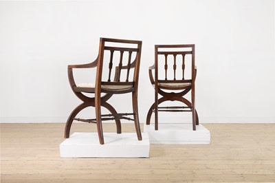 Lot 171 - A pair of mahogany armchairs in the Regency taste