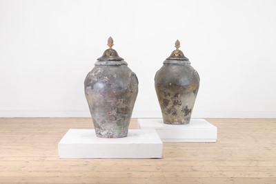 Lot 176 - A pair of painted terracotta urns