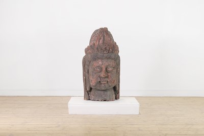 Lot 177 - A carved and painted wooden head of Buddha