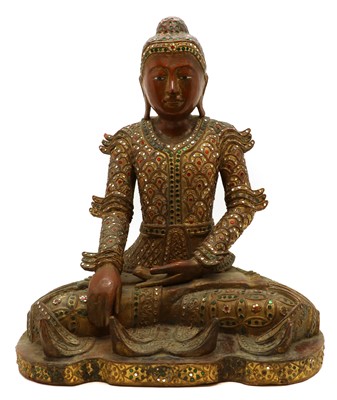 Lot 176 - A painted wood buddha
