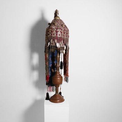 Lot 147 - A white-metal-mounted headdress