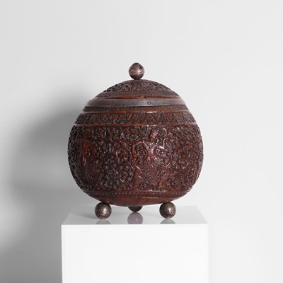 Lot 132 - A silver-mounted coconut box and cover
