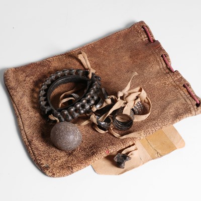 Lot 61 - A group of objects found inside a Ganges crocodile