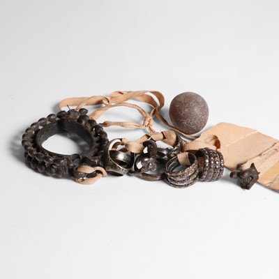 Lot 61 - A group of objects found inside a Ganges crocodile