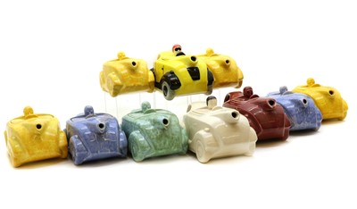 Lot 243 - A collection of Sadler art deco racing car teapots