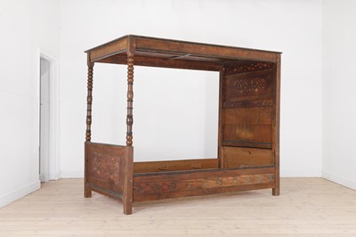 Lot 559 - A painted four-poster single bed