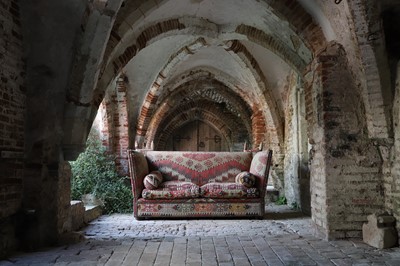 Lot 7 - A kilim-upholstered Knole sofa by George Smith