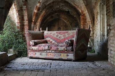Lot 7 - A kilim-upholstered Knole sofa by George Smith