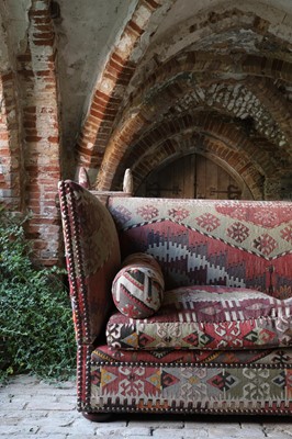 Lot 7 - A kilim-upholstered Knole sofa by George Smith