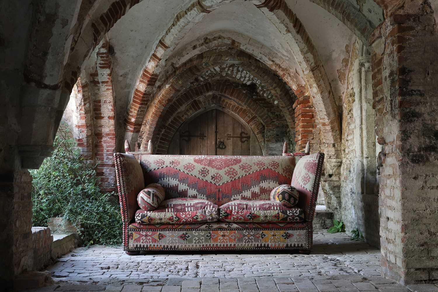 Lot 7 - A kilim-upholstered Knole sofa by George Smith